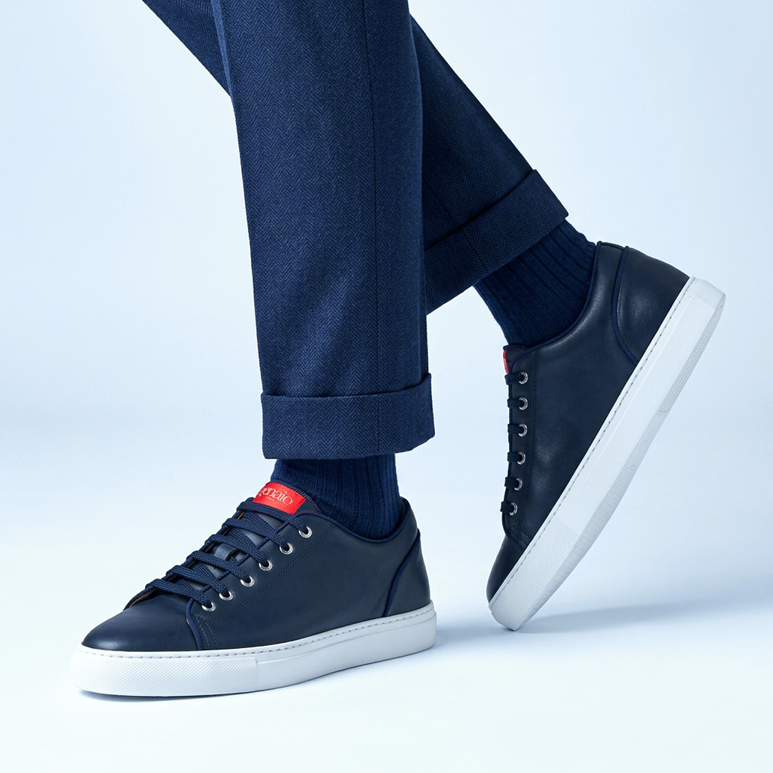 INIZIO Navy Blue dress sneaker by Genaio, worn with tailoring